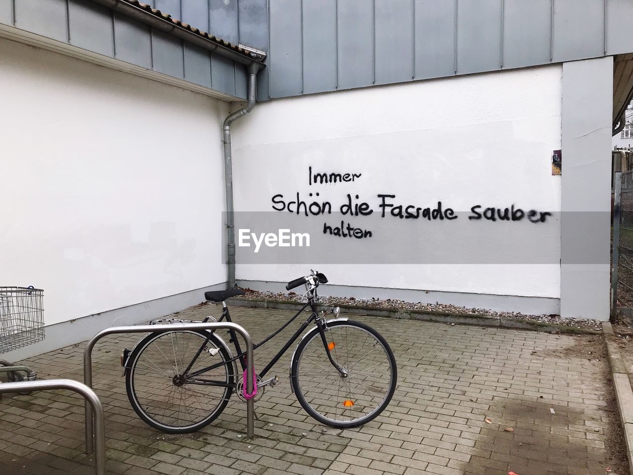 BICYCLE PARKED ON WALL