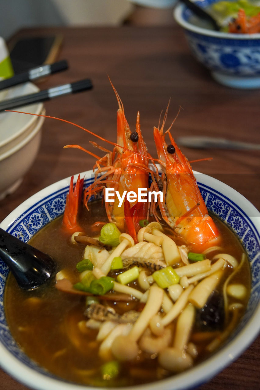 Close-up of seafood noodles in a bowl on table