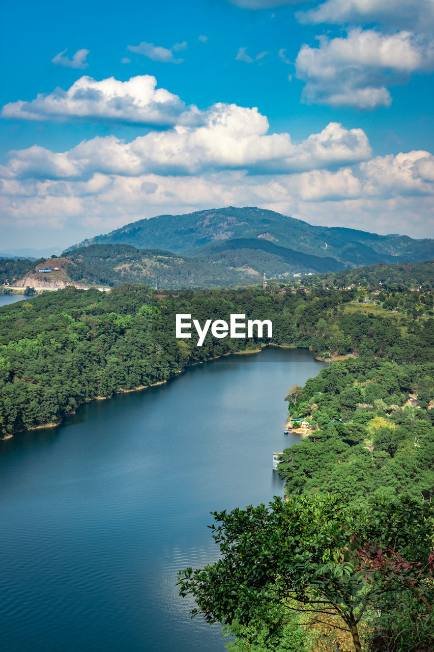 Serene lake with mountain background at day from top angle