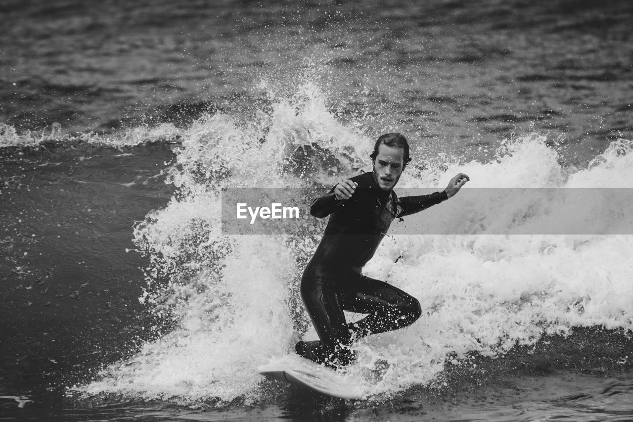 Man surfing in sea