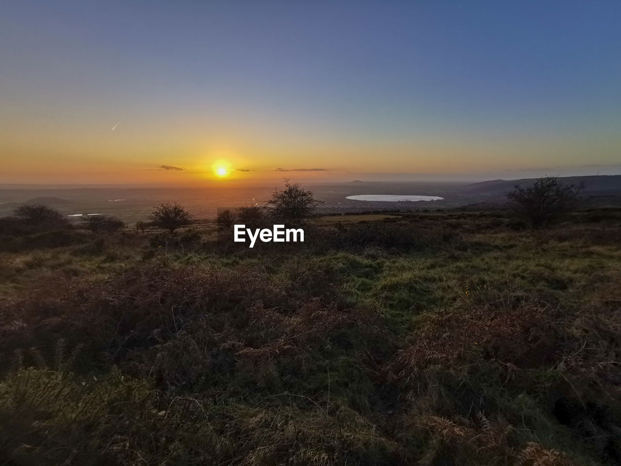 SCENIC VIEW OF SEA DURING SUNSET