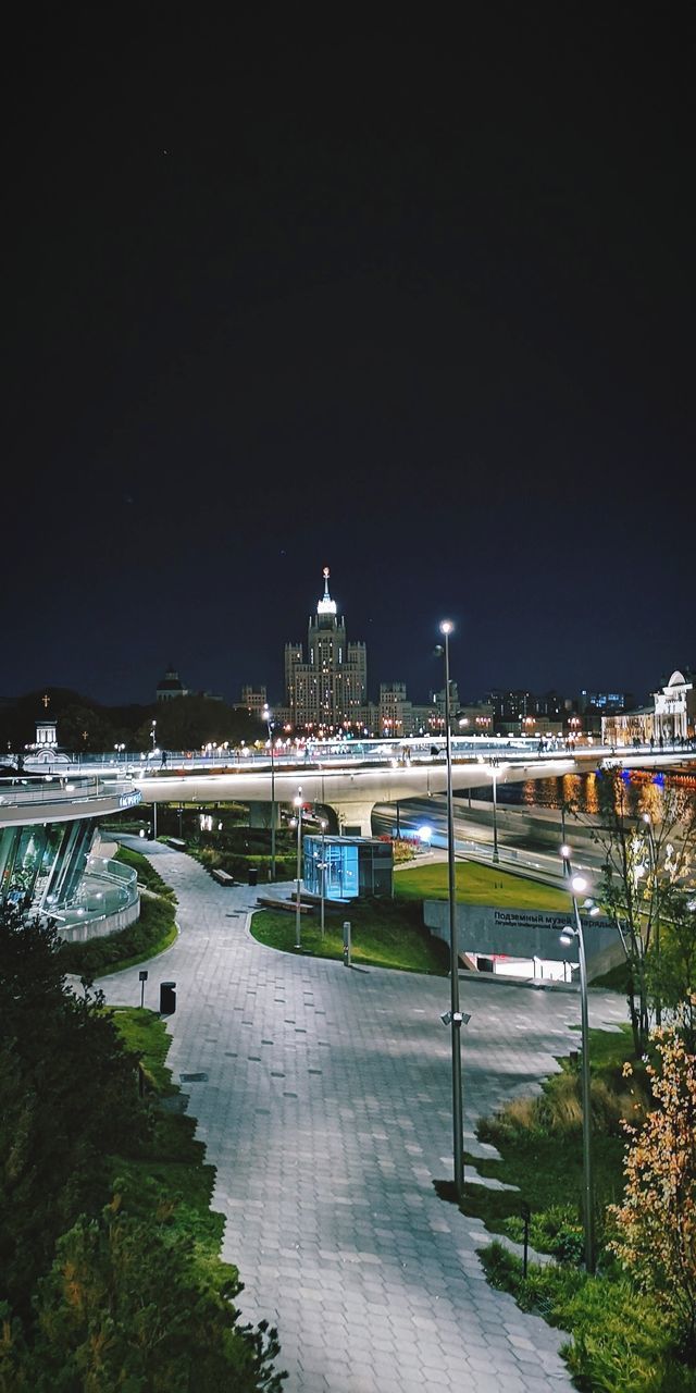 Illuminated buildings in city at night