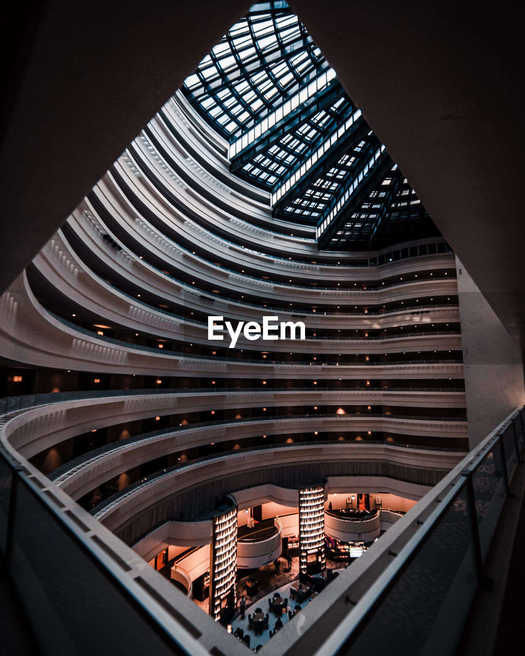 HIGH ANGLE VIEW OF ILLUMINATED BUILDINGS IN CITY