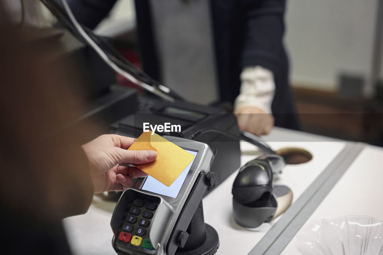 Man paying in department store