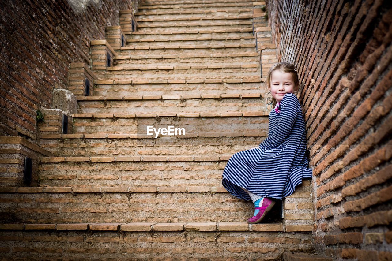Portrait of girl on steps