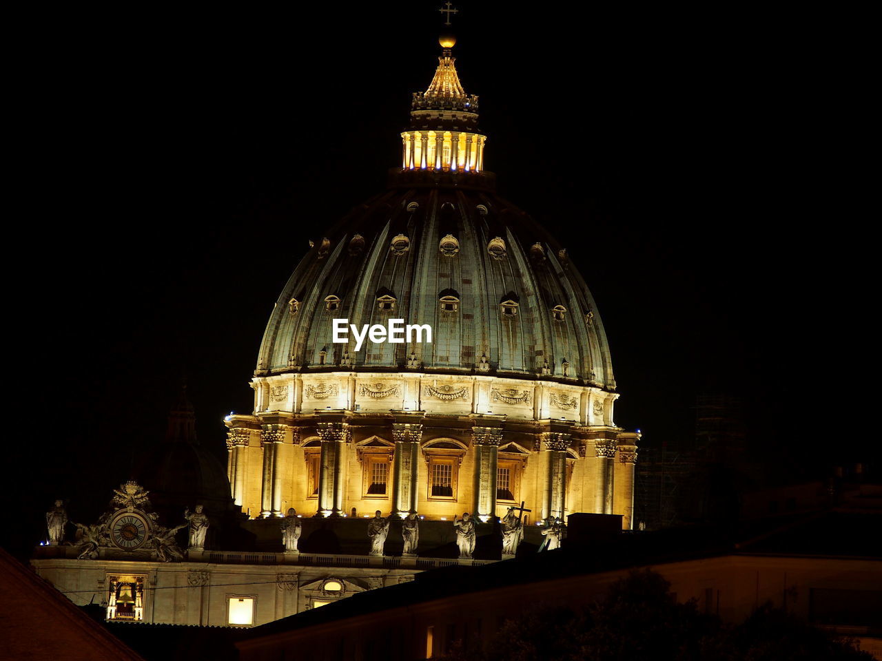 LOW ANGLE VIEW OF ILLUMINATED CATHEDRAL