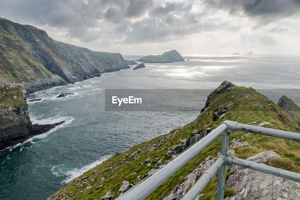 View of calm sea against cloudy sky