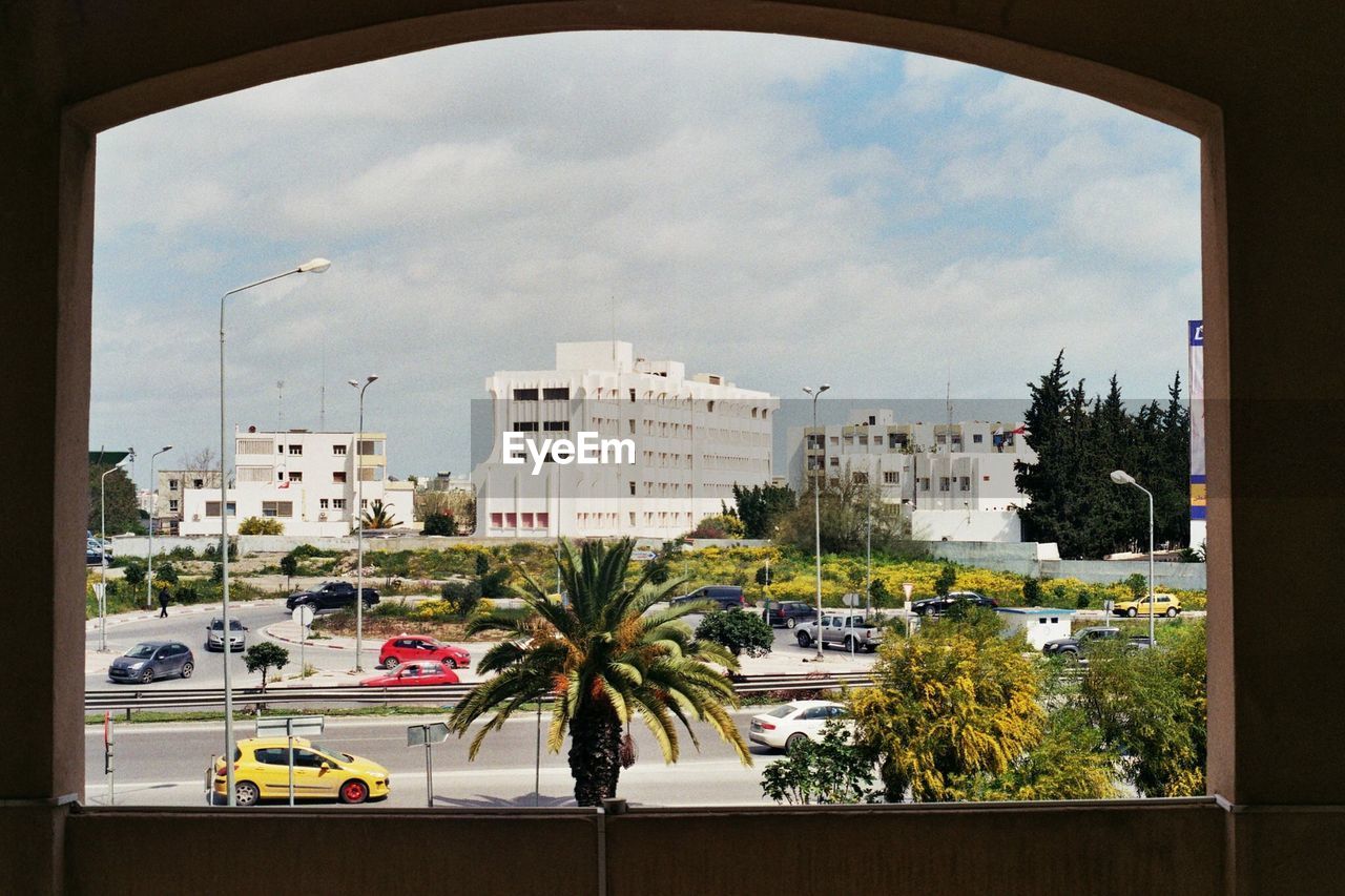 BUILDINGS IN CITY AGAINST SKY