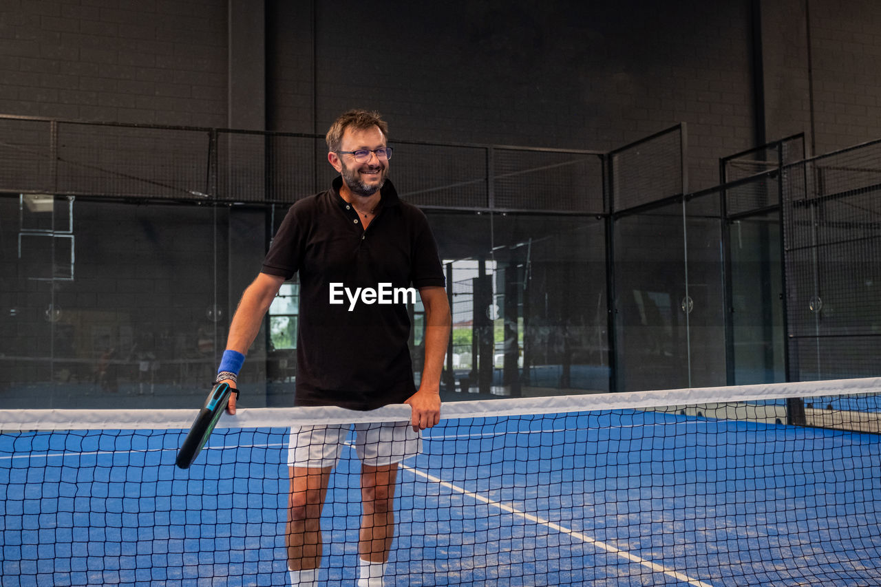 Full length portrait of a man playing