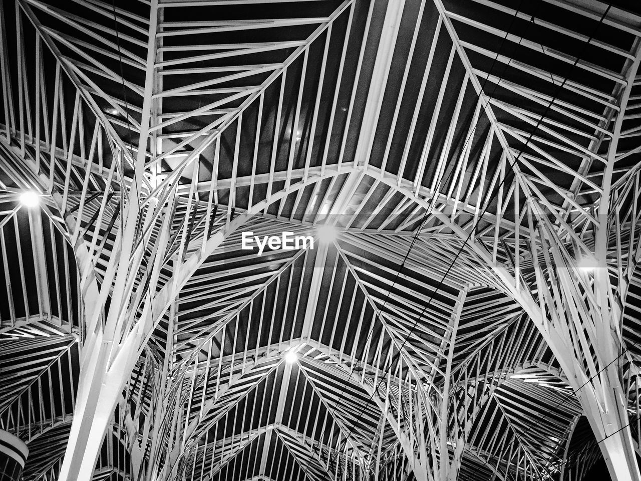 Low angle view of illuminated ceiling