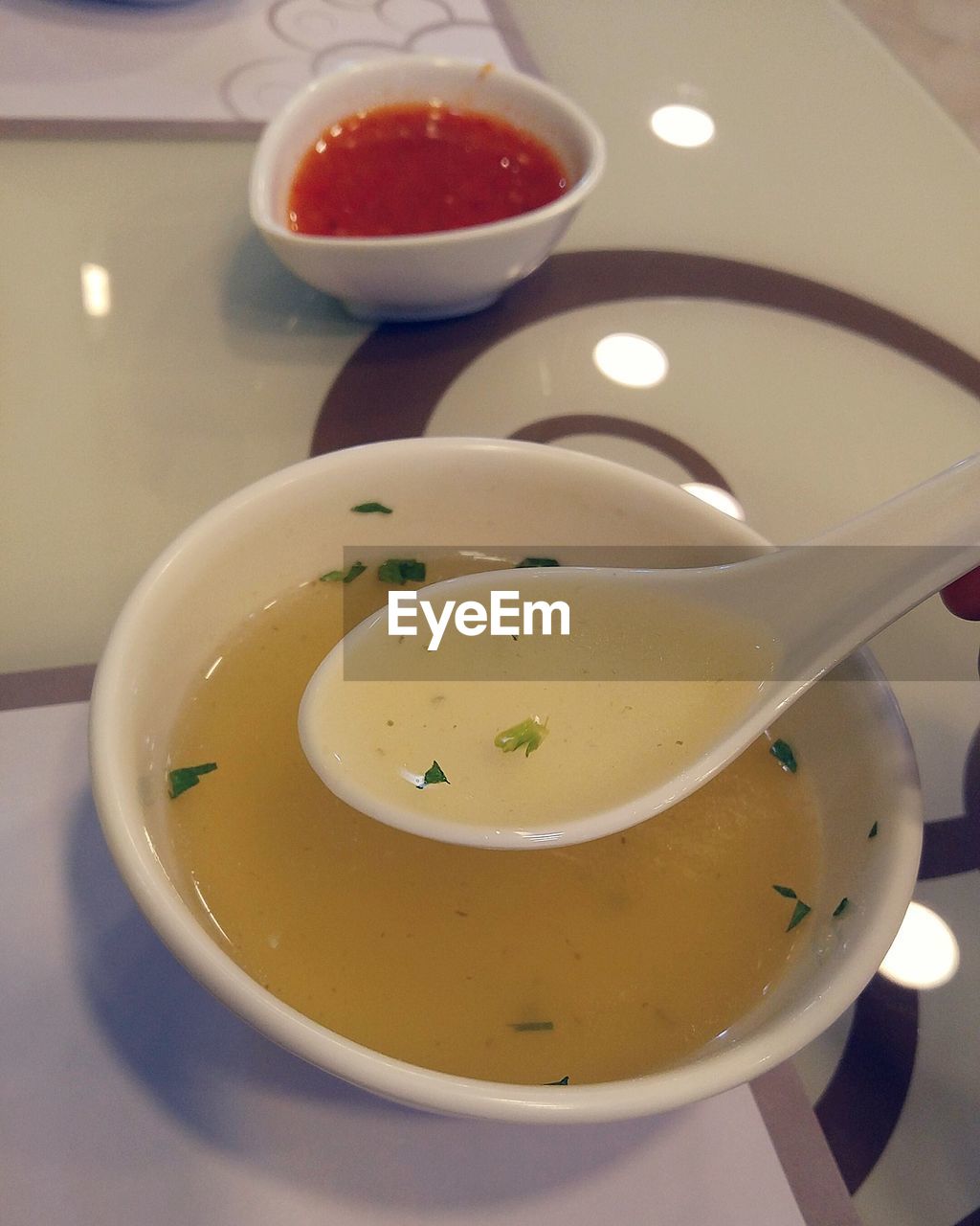 CLOSE-UP OF SOUP ON TABLE