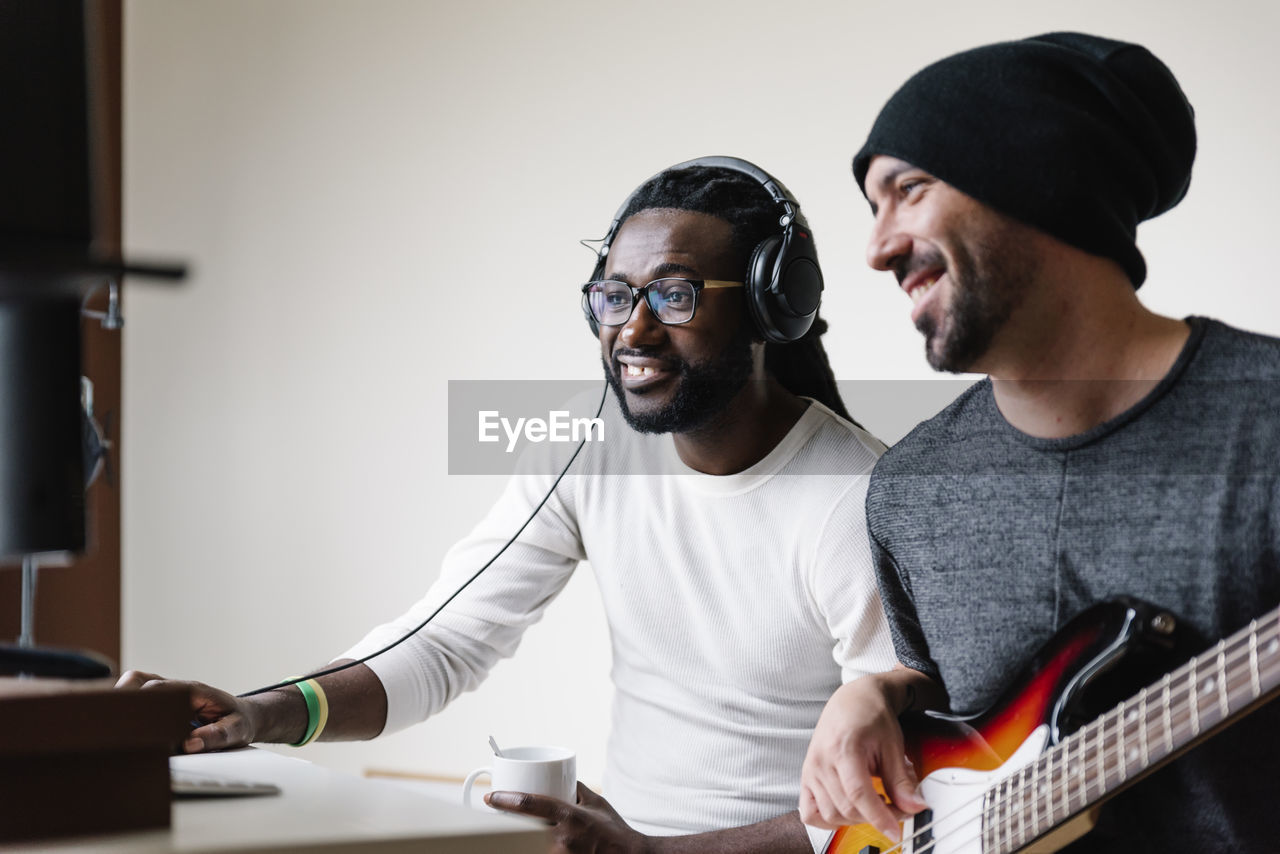 Musicians playing music in studio