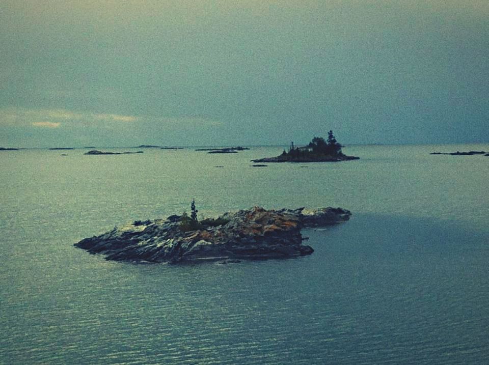 VIEW OF BOATS IN SEA