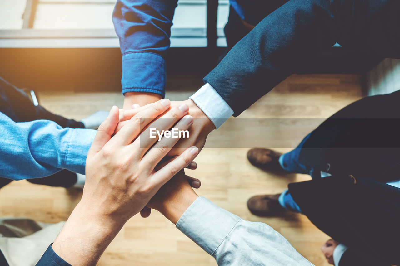 Close-up of business colleagues working in office