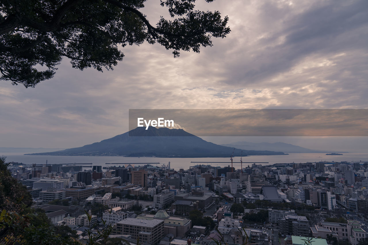 Aerial view of city at sunset