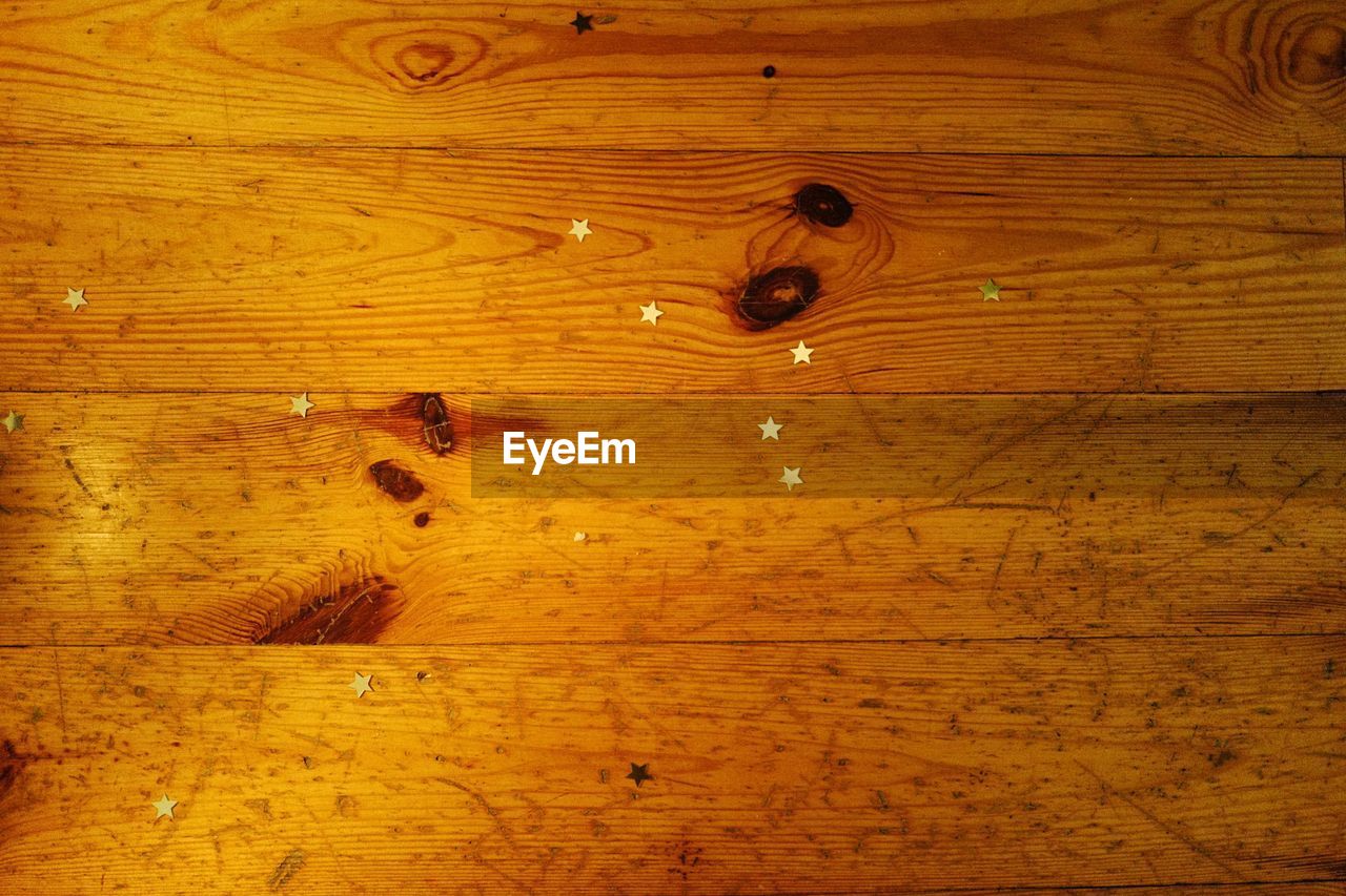 High angle view of star decoration on wooden table