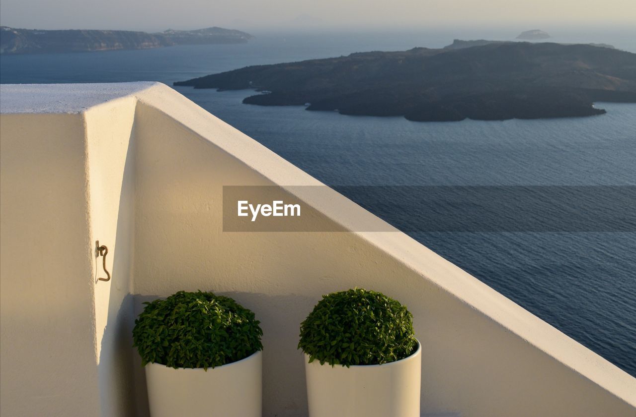 High angle view of potted plants by sea