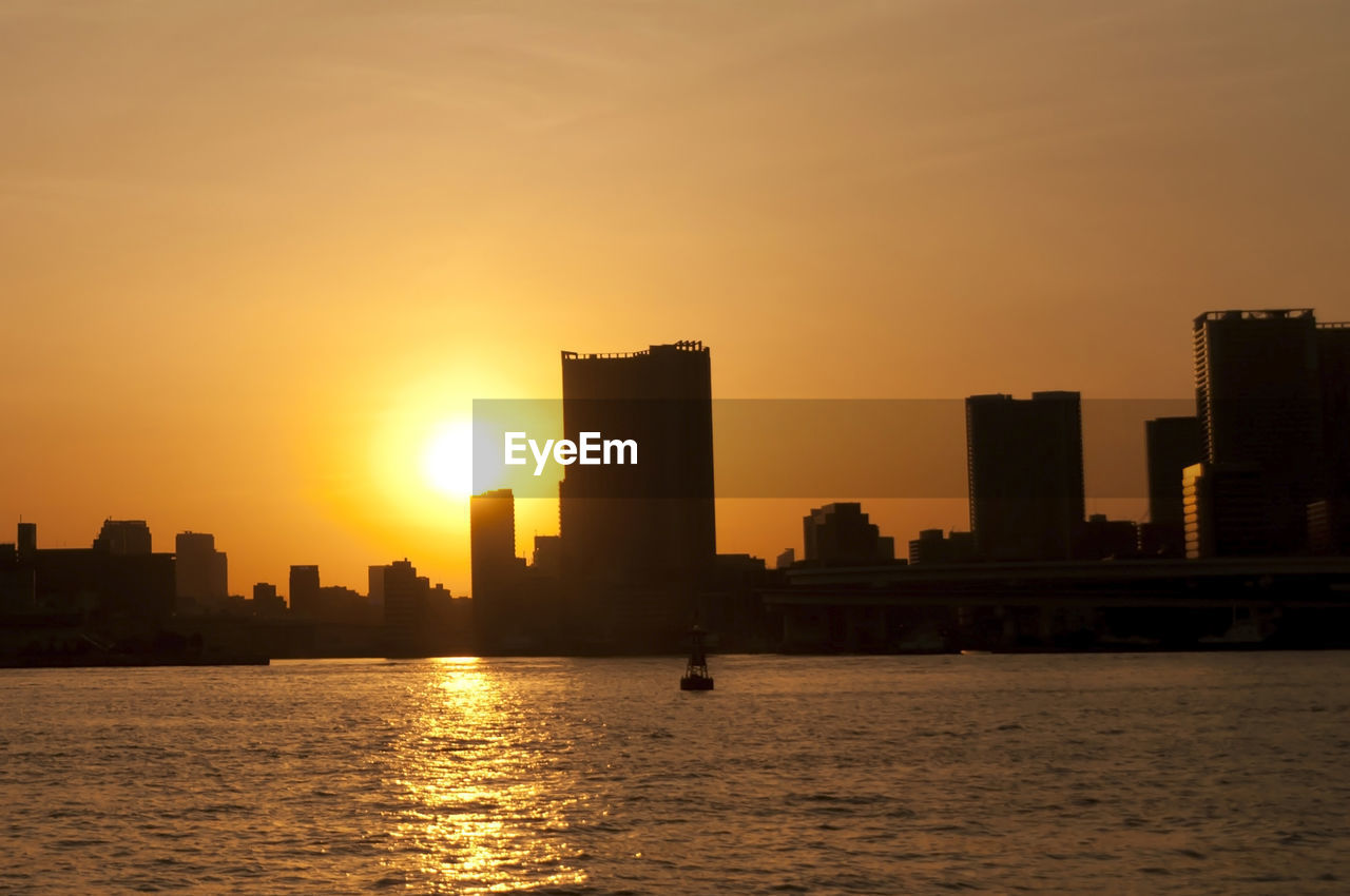 Silhouette of buildings at sunset