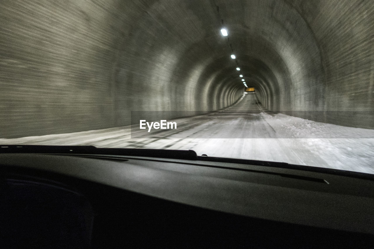 ROAD IN SNOW COVERED TUNNEL