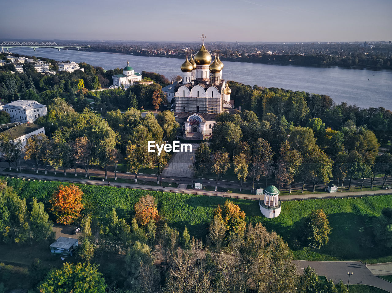 Aerial view of assumption cathedral by volga river in city against sky, yaroslavl, russia