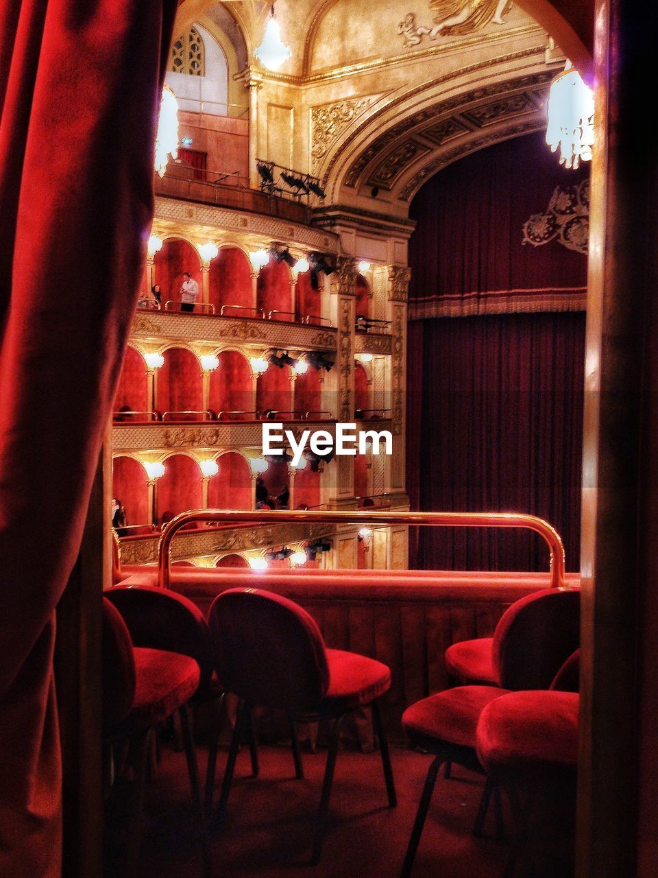 Chairs in illuminated room, theater 