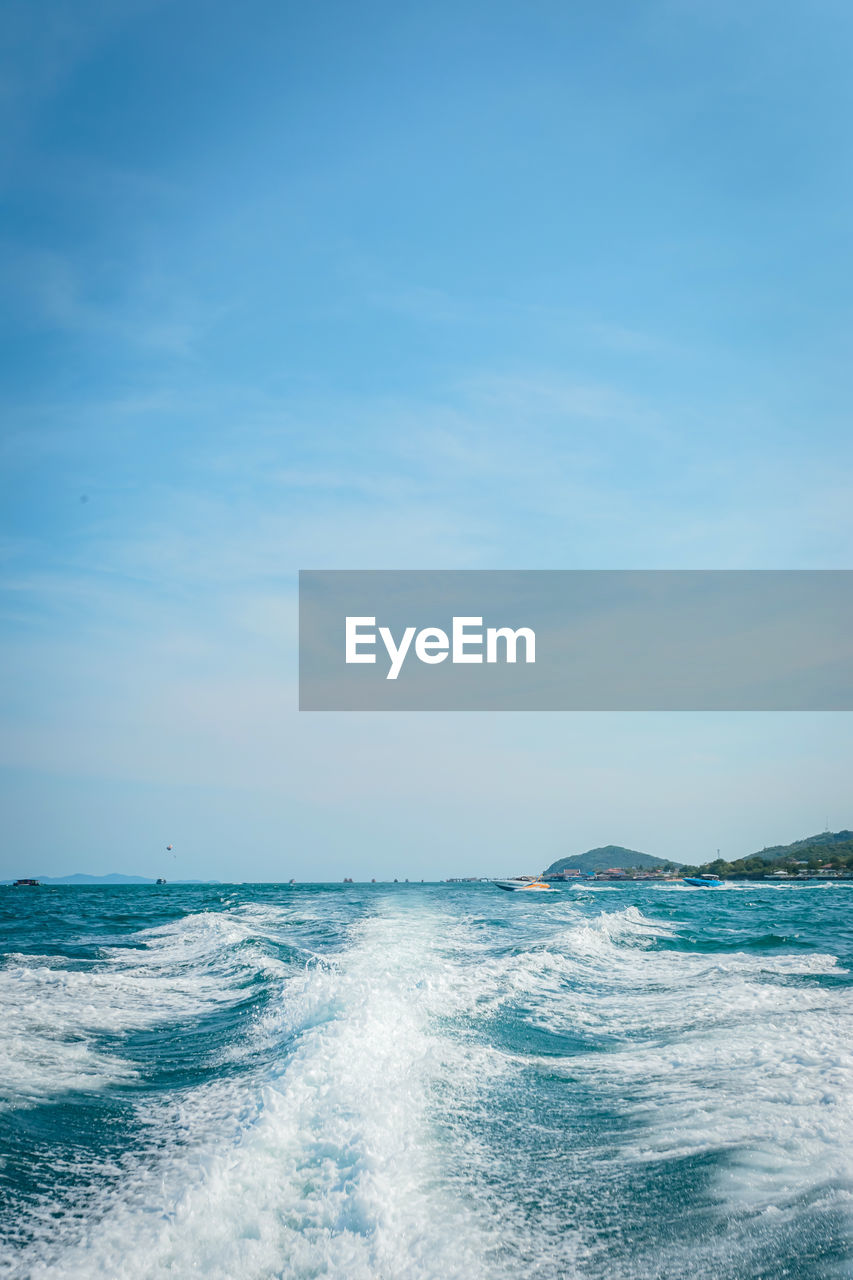 VIEW OF SEA AGAINST BLUE SKY