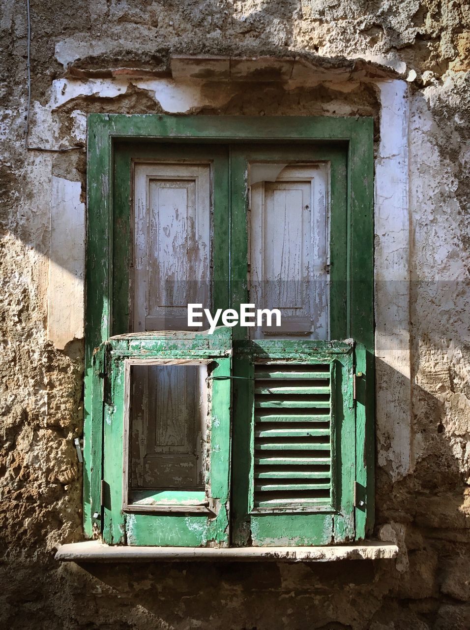 CLOSE-UP OF ABANDONED HOUSE