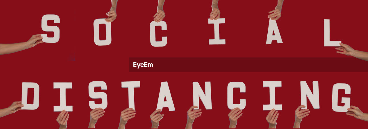 CLOSE-UP OF TEXT ON RED WALL