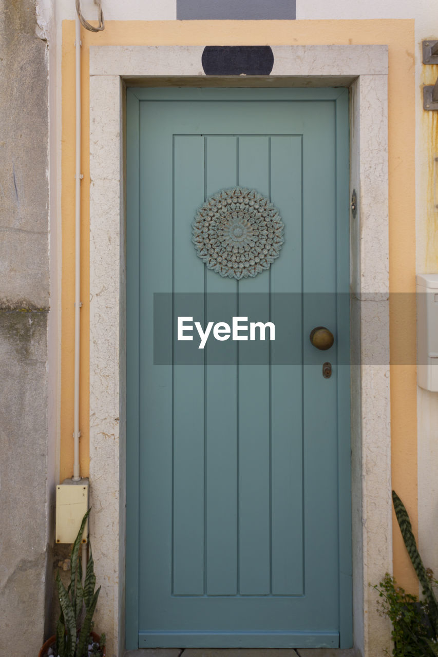 CLOSED DOOR OF WINDOW OF HOUSE