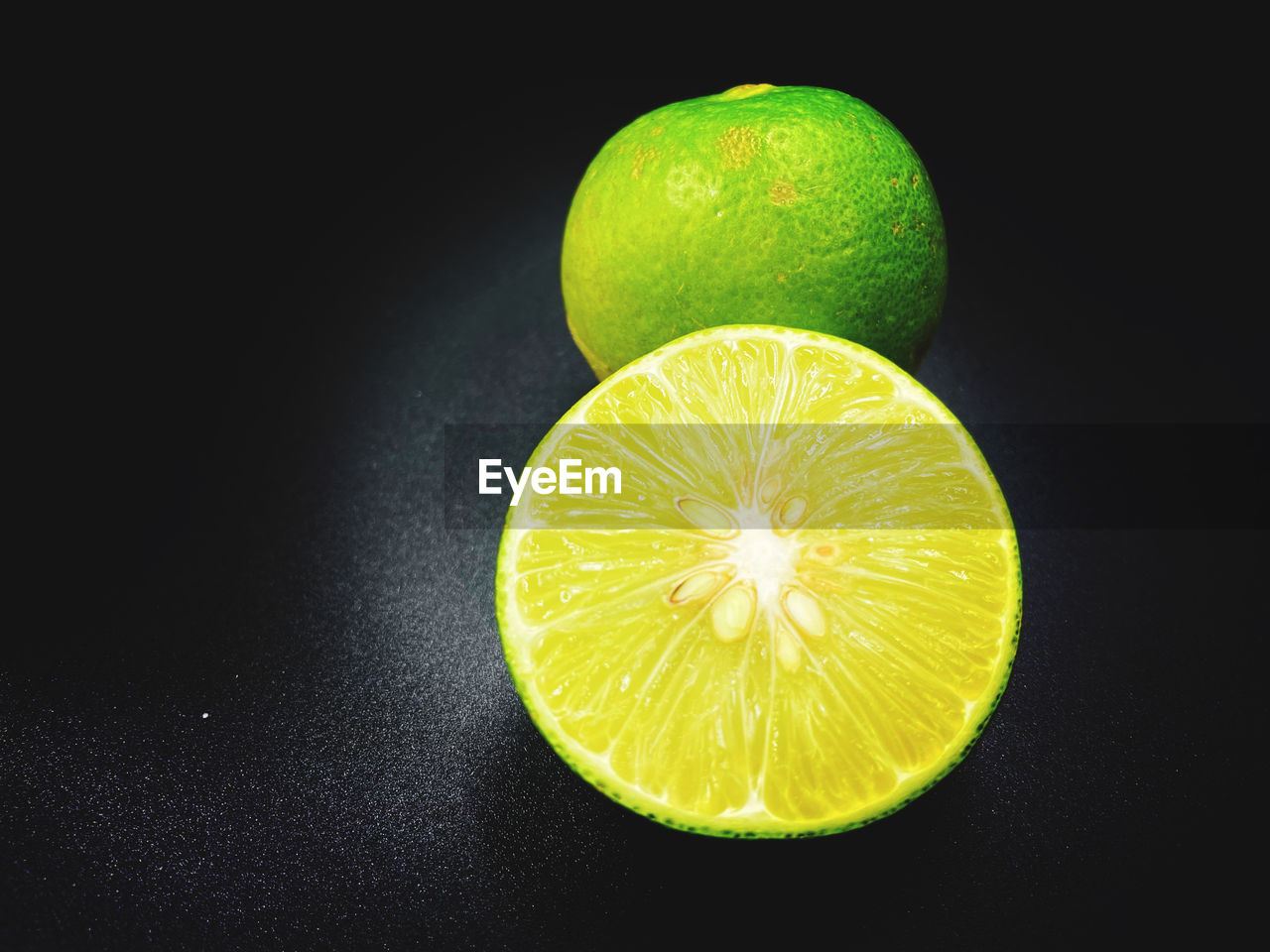  lemon against black background