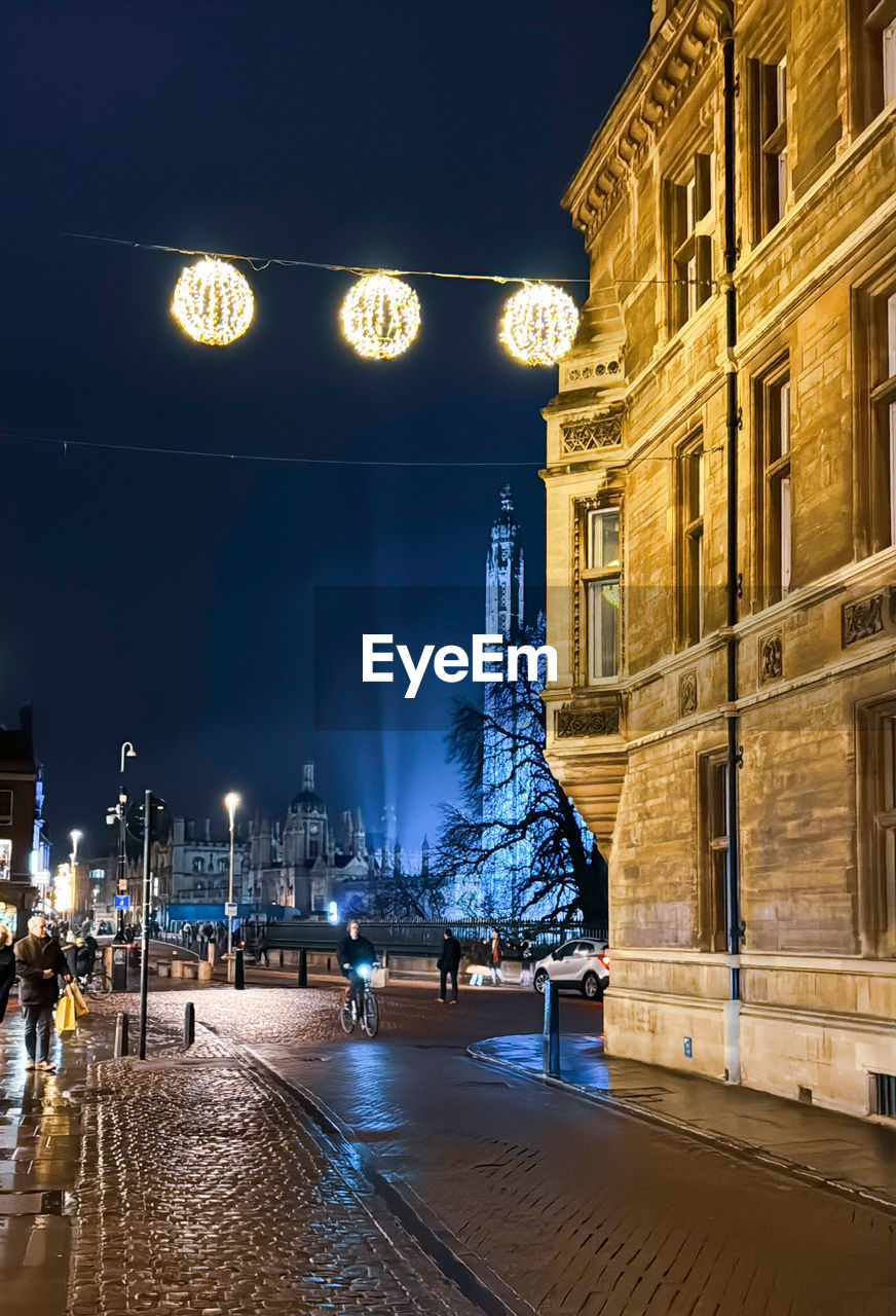 view of illuminated buildings in city at night