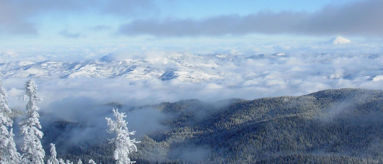 Aerial view of snow covered mountains