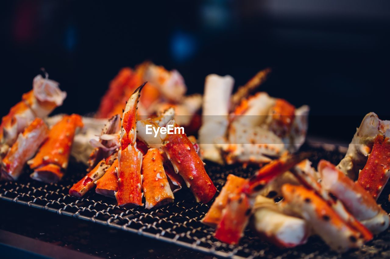 Close-up of crabs on barbecue grill