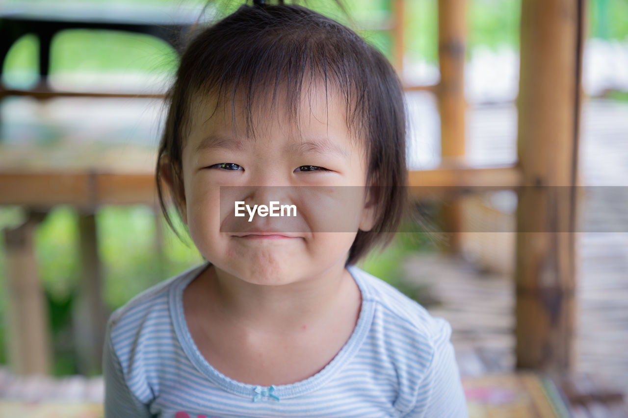 Portrait of cute girl smiling