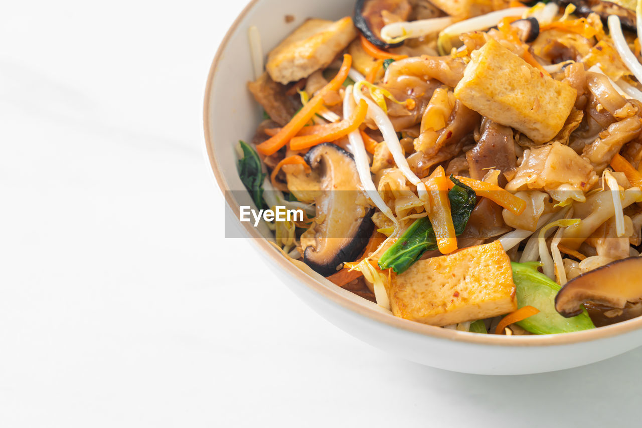 high angle view of food in bowl against white background