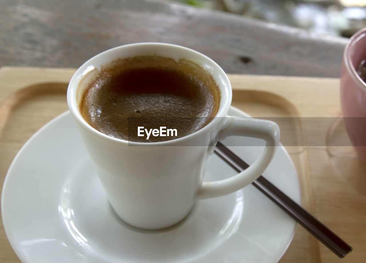 high angle view of coffee and drink on table