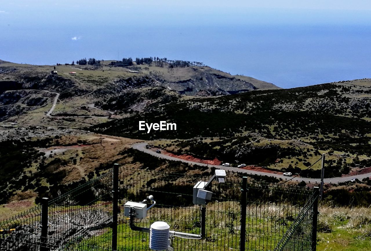 SCENIC VIEW OF MOUNTAIN AGAINST SKY