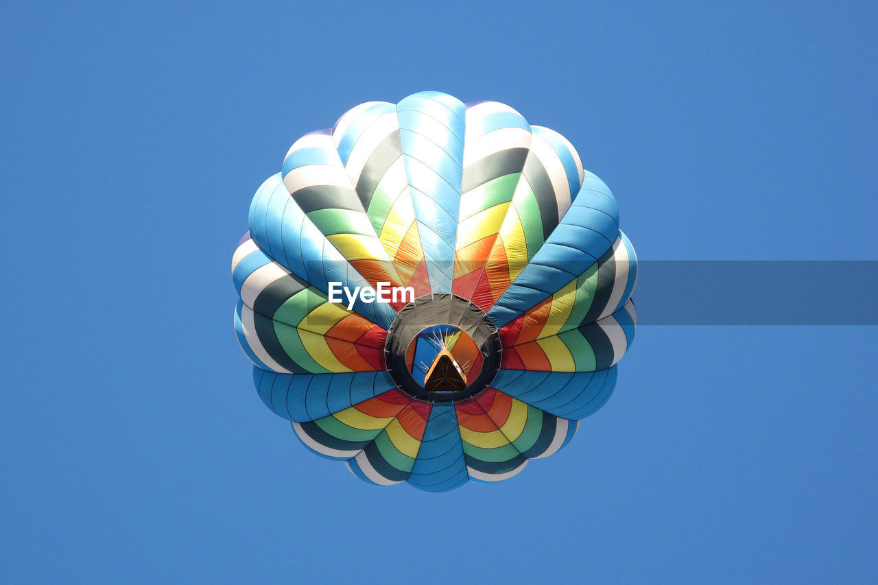 LOW ANGLE VIEW OF HOT AIR BALLOON