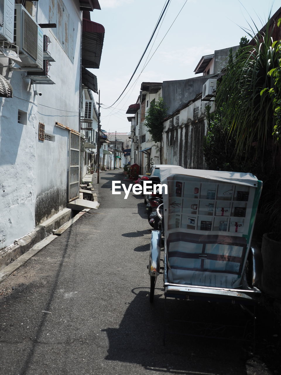 VIEW OF STREET AMIDST BUILDINGS