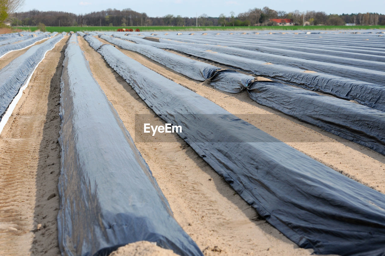 Black fabrics on agricultural field