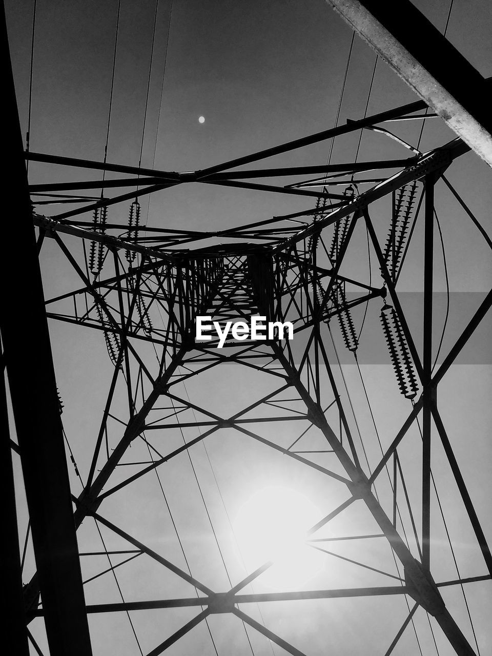 LOW ANGLE VIEW OF ELECTRICITY PYLON