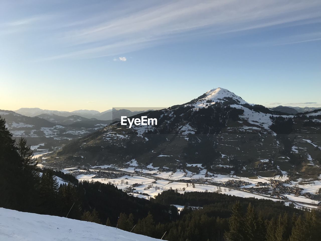 SCENIC VIEW OF MOUNTAINS AGAINST SKY DURING WINTER