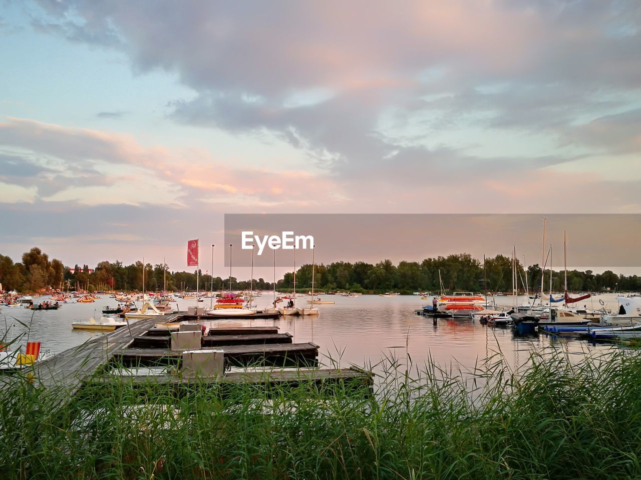 VIEW OF BOATS MOORED AT HARBOR