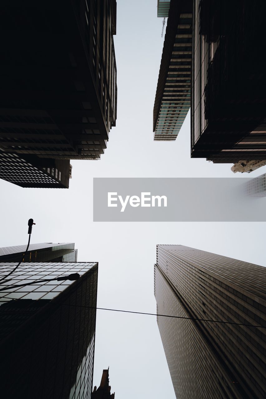 Buildings against clear sky