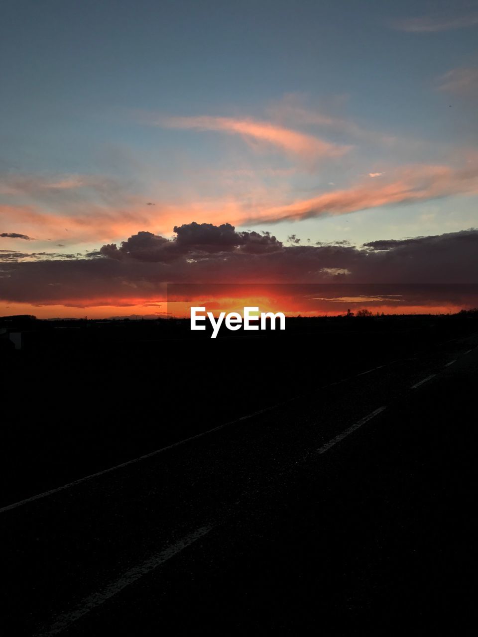 SCENIC VIEW OF SILHOUETTE LANDSCAPE AGAINST SKY DURING SUNSET