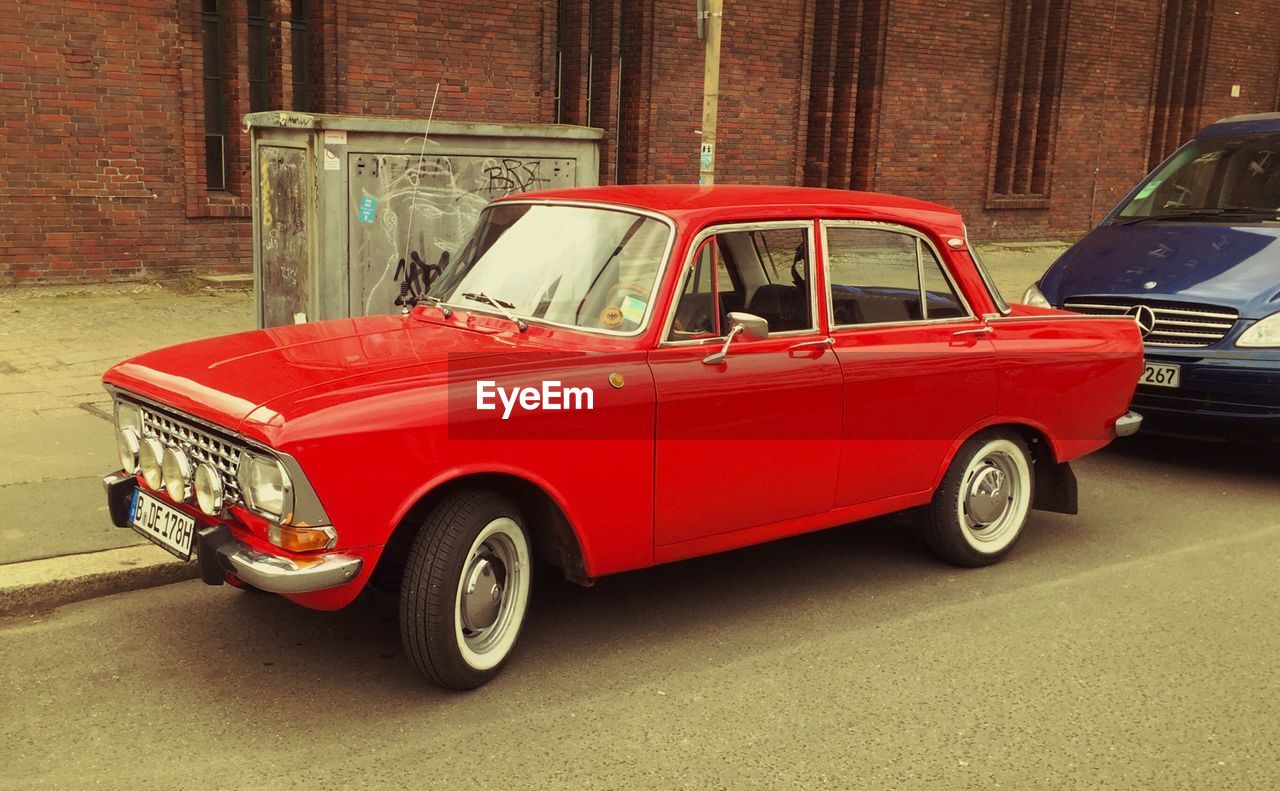 VINTAGE CAR PARKED ON STREET