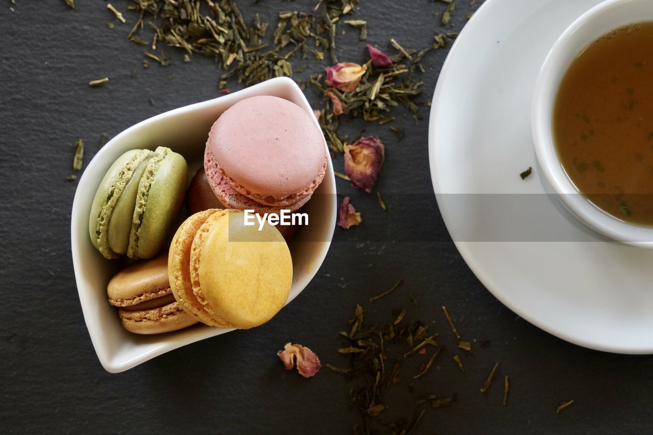 High angle view of coffee and dessert on table