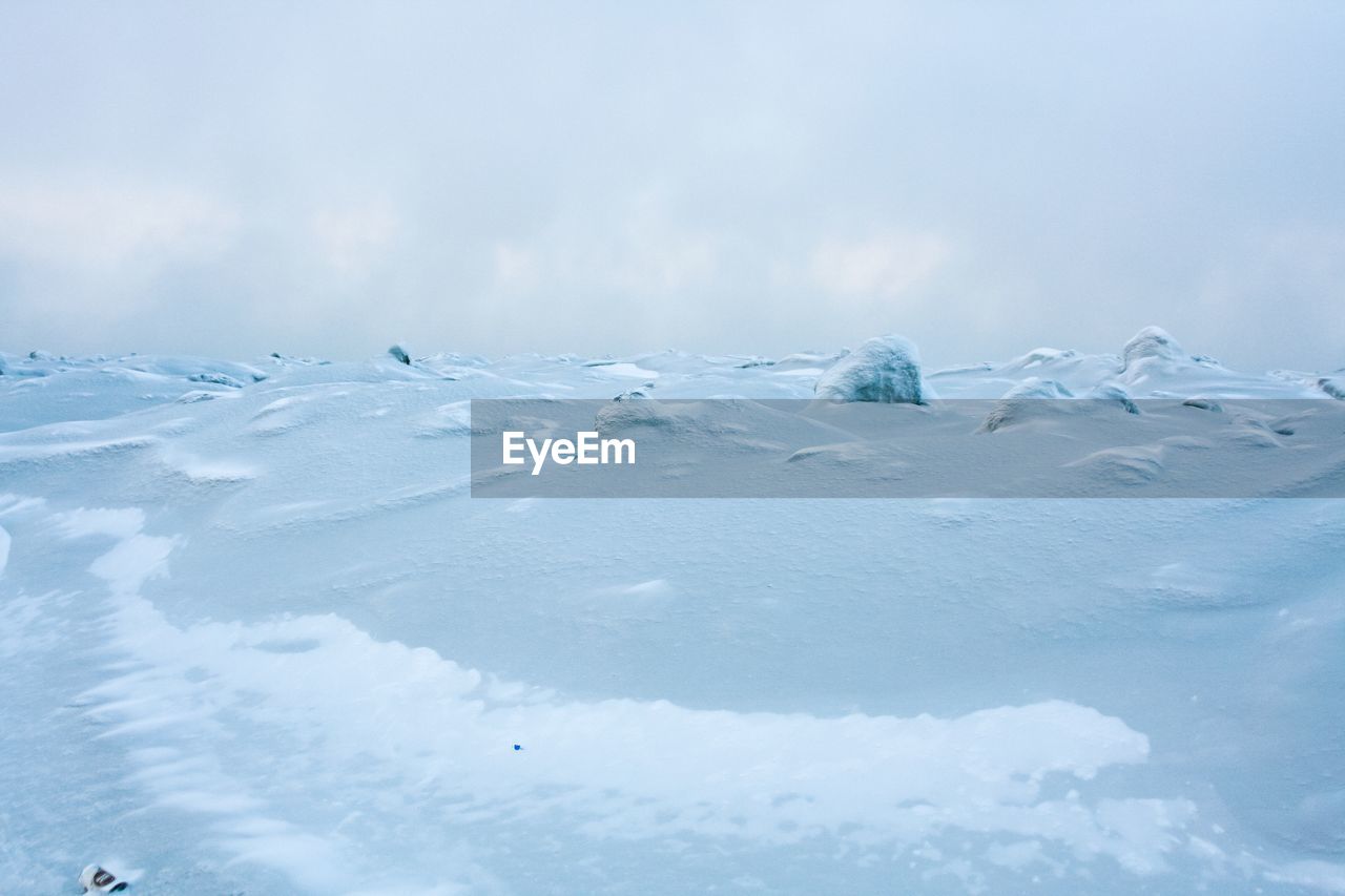 VIEW OF SNOW COVERED LANDSCAPE