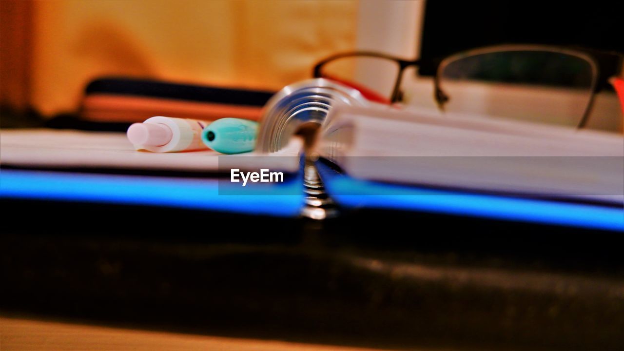 CLOSE-UP OF TELEPHONE ON TABLE