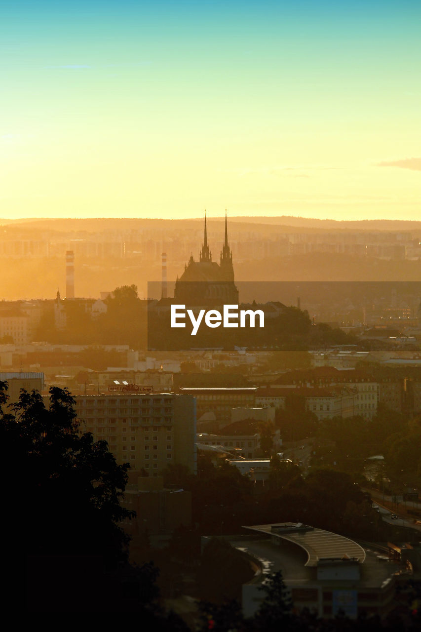 High angle view of cityscape against sky during sunset